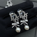 X1Q85D136X Popular Necklace. Earrings