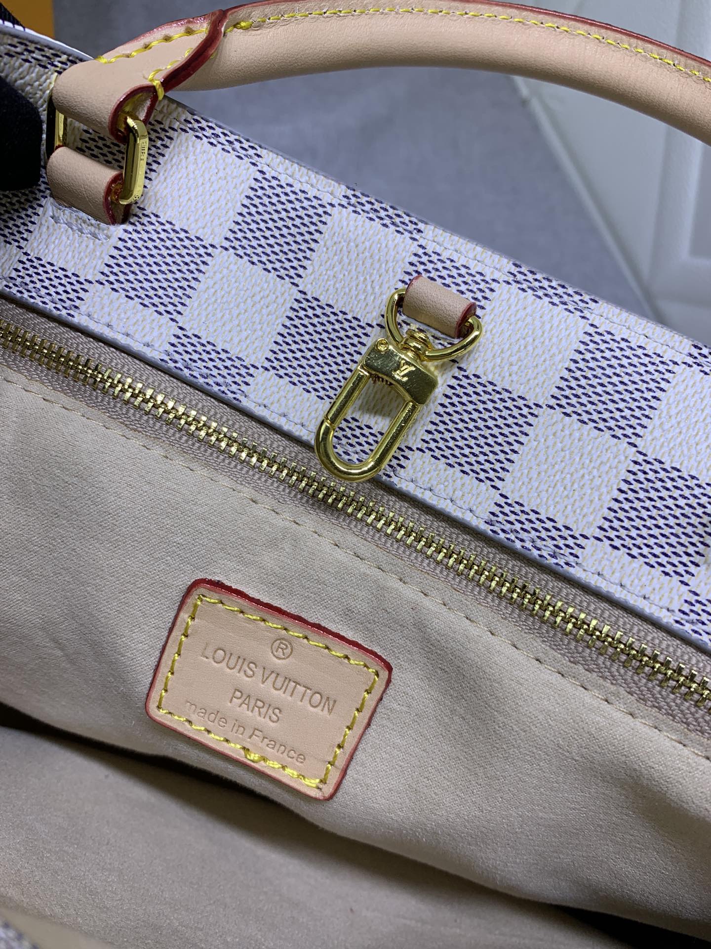 B12X44E330 Popular   leather bag 